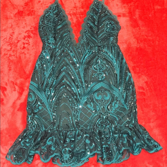 emerald green bandage frill hem bodycon dress